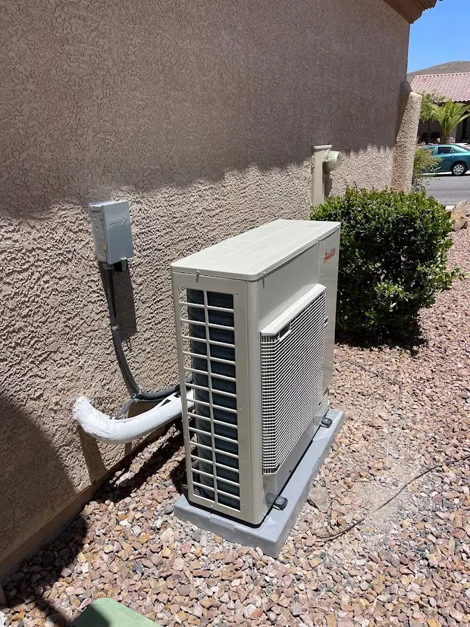 Residential air conditioning condenser unit in North Alamo